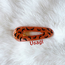 Load image into Gallery viewer, Orange Glow Bat Hair Clips