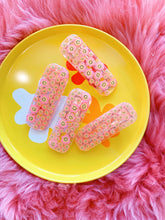 Load image into Gallery viewer, Pink Smiley Daisy Hair Clips