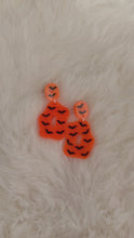 Load and play video in Gallery viewer, Orange Glow Bat Pepper Earrings
